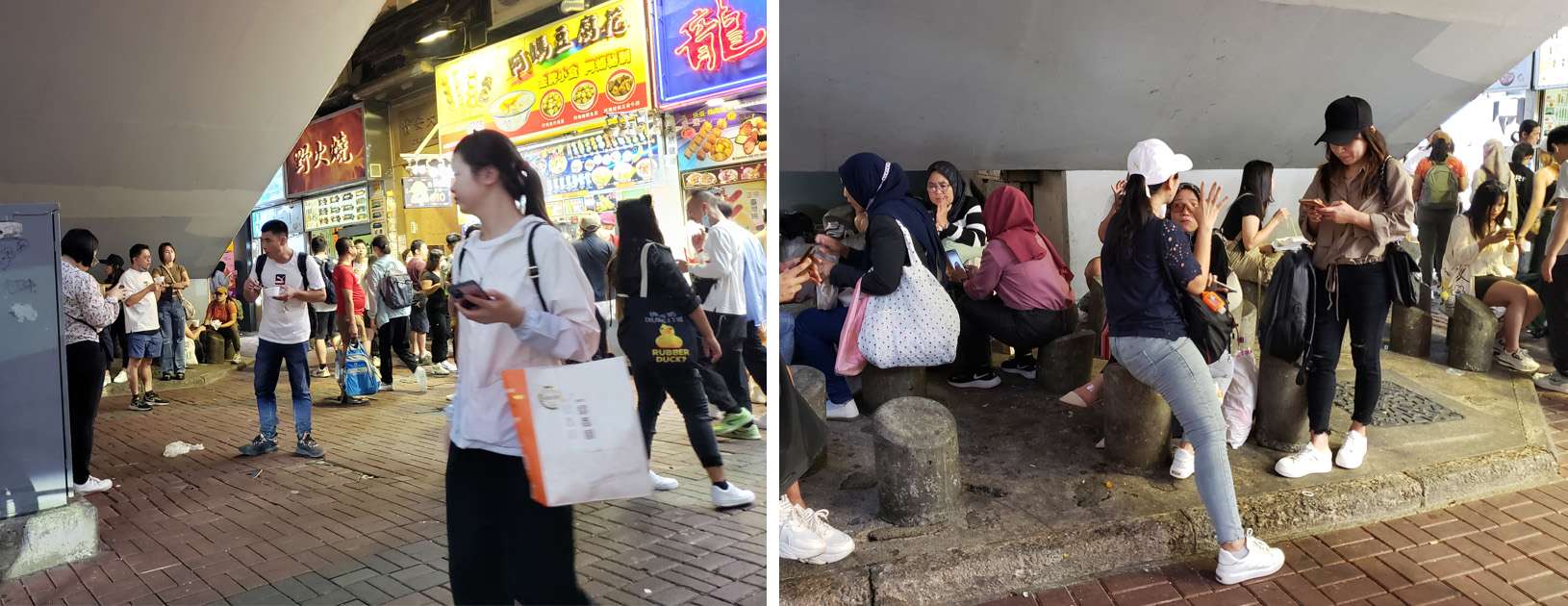 Anti-homeless bollards are used as seating by street food stand patrons.