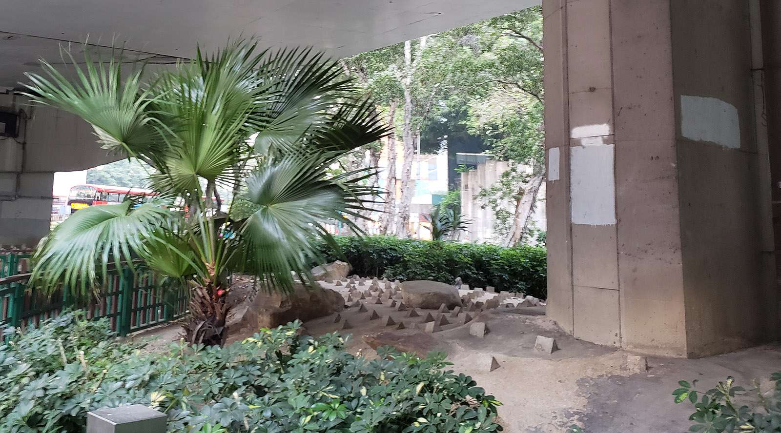 Anti-homeless concrete spikes and boulders under a flyover in Yau Ma Tei